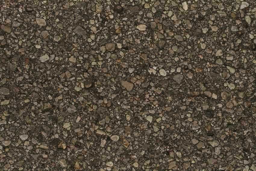 Surface de gravier et de terre compactée Surface de gravier et de terre compactée